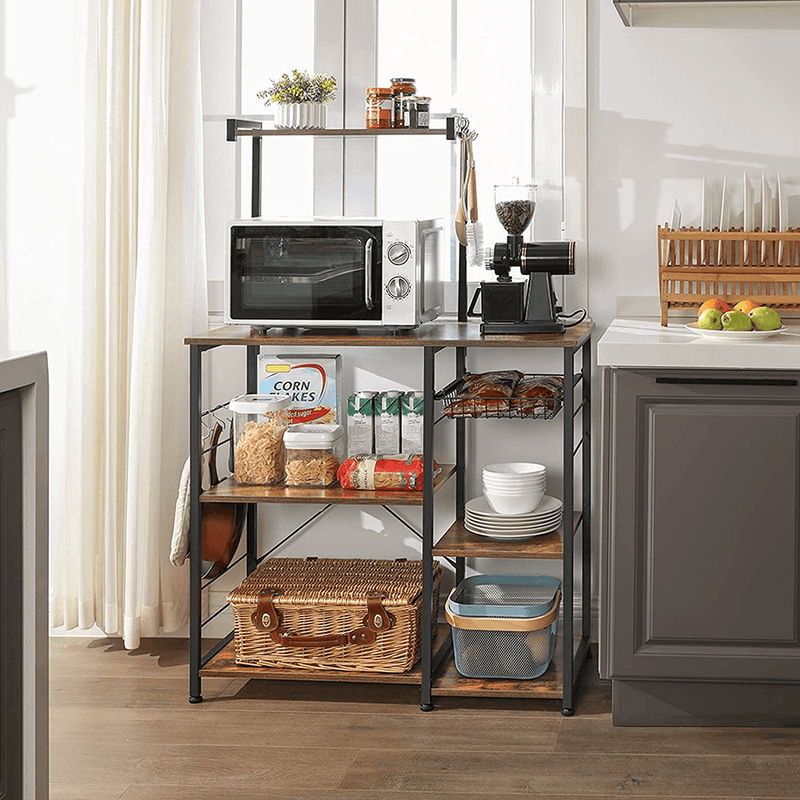 VASAGLE Baker’s Rack, Coffee Station, Microwave Oven Stand, Kitchen Shelf with Wire Basket, 6 S-Hooks, Utility Storage for Spices, Pots, and Pans, Rustic Brown and Black UKKS35X
